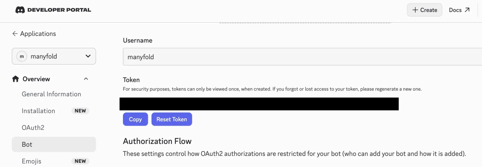 The Discord application Bot settings page with the token redacted