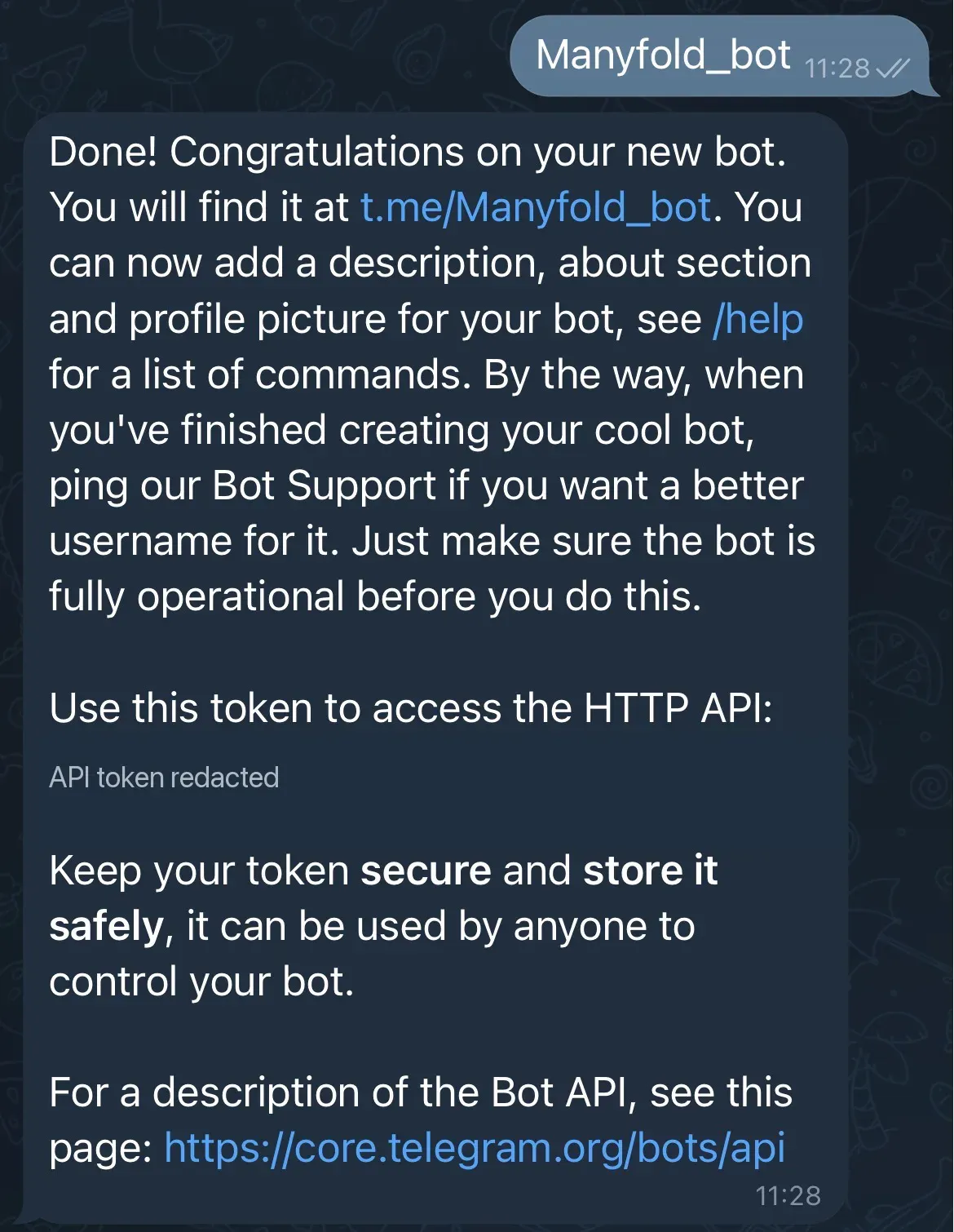 The BotFather confirmation message with the bot token redacted